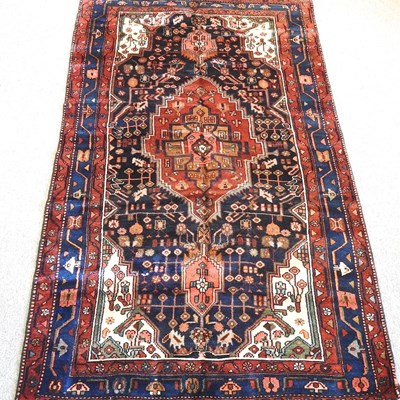 Lot 725 - A Persian rug