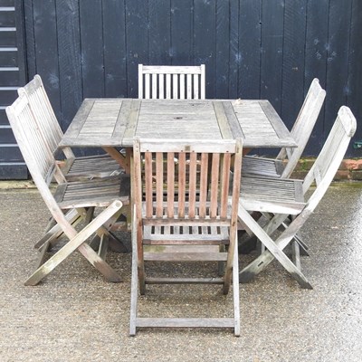 Lot 404 - A teak garden set