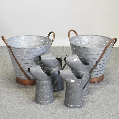 Lot 406 - Four various galvanised jugs