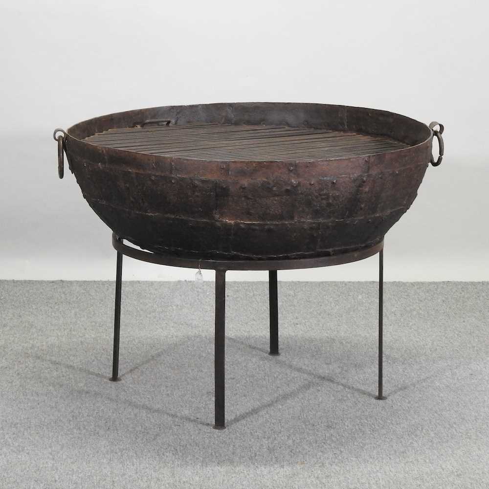 Lot 305 - A very large metal fire pit