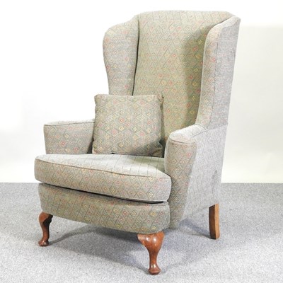 Lot 352 - A wing armchair