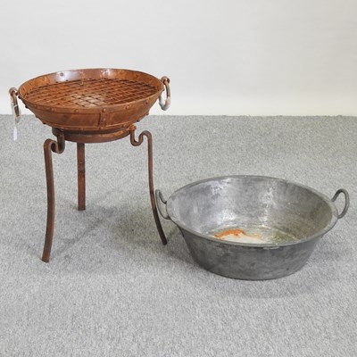 Lot 342 - A small metal fire pit, together with a metal skillet