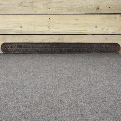 Lot 383 - A cast iron sign