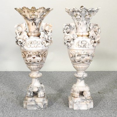 Lot 82 - Two stone urns