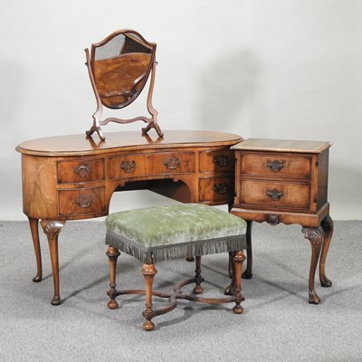 Lot 272 - A 1930's walnut kidney shaped dressing table