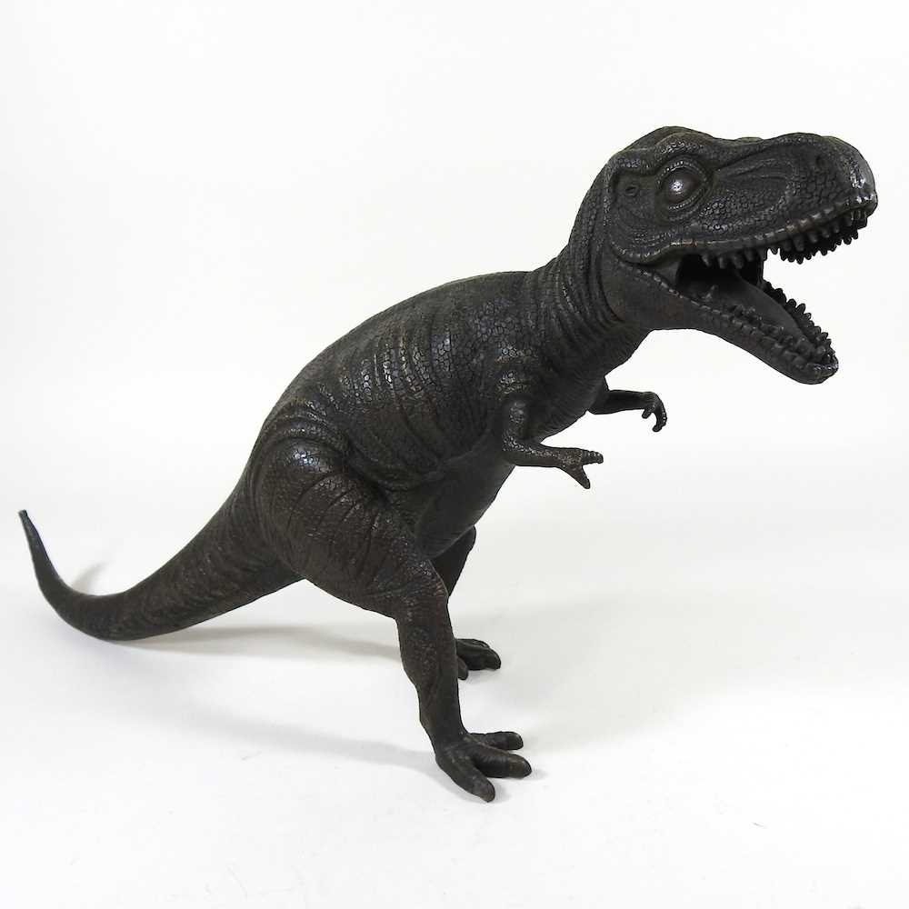 Lot 384 - A bronze dinosaur