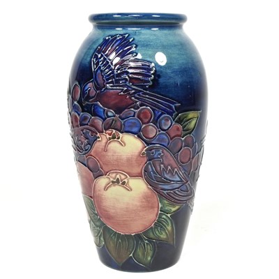 Lot 362 - A Moorcroft pottery birds and fruit pattern vase