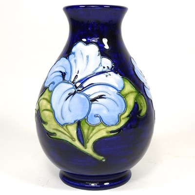 Lot 24 - A Moorcroft pottery Hibiscus pattern vase