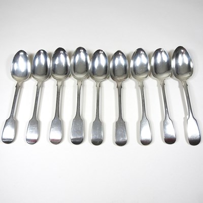 Lot 338 - Nine silver table spoons