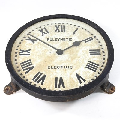Lot 4 - A cast iron Pulsynetic electric wall clock