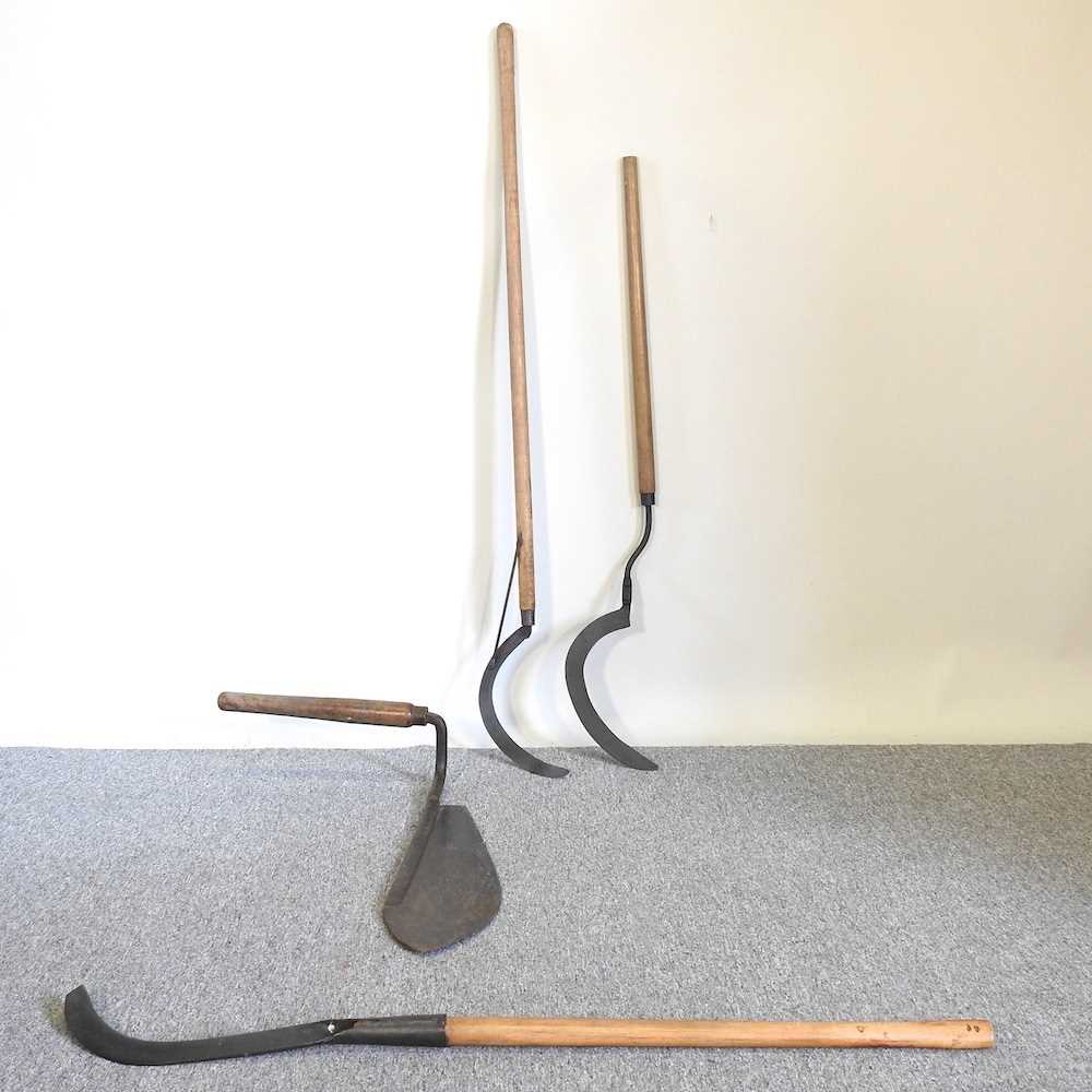 Lot 303 - Vintage hand scythes