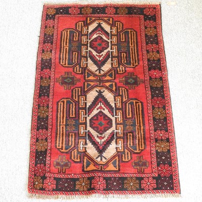 Lot 98 - A baluchi rug