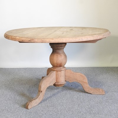 Lot 51 - A pine dining table