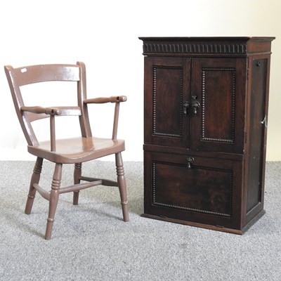 Lot 702 - A cabinet and chair