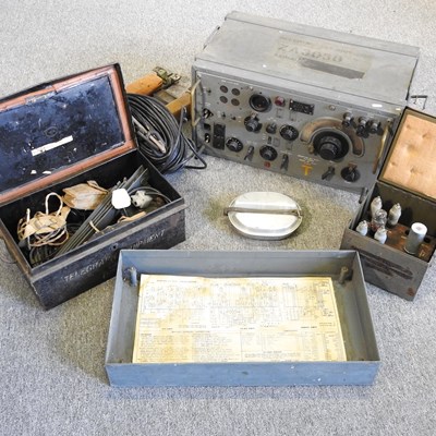 Lot 173 - A military valve radio