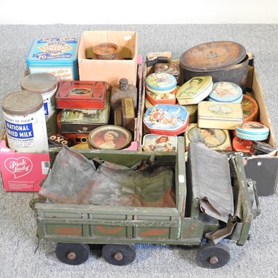 Lot 330 - A military model truck and vintage advertising tins