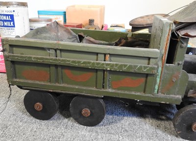 Lot 330 - A military model truck and vintage advertising tins