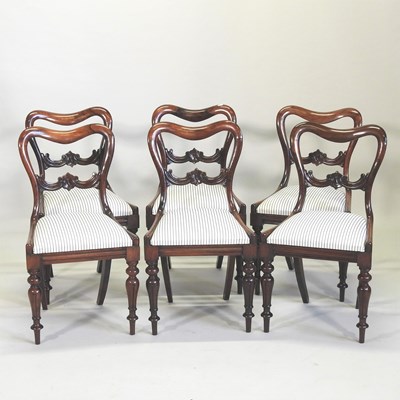Lot 116 - A set of six Victorian rosewood kidney back dining chairs