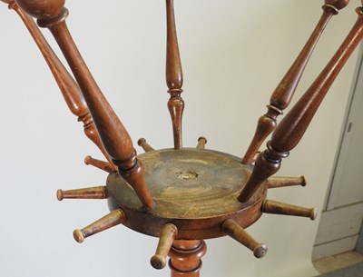 Lot 99 - A pair of Edwardian walnut hat stands