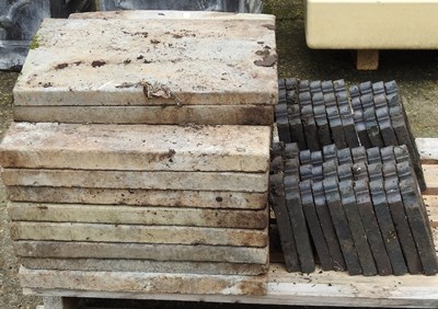 Lot 150 - A quantity of patio slabs and lawn edge tiles