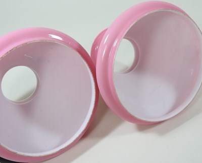 Lot 405 - A near pair of pink glass peg oil lamp shades