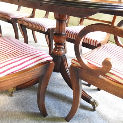 Lot 164 - A table and chairs