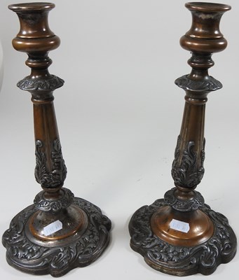 Lot 143 - A pair of candlesticks