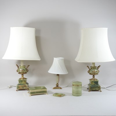 Lot 195 - A pair of green onyx and brass mounted table lamps