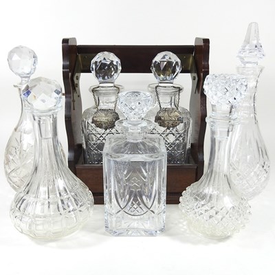 Lot 664 - A tantalus and decanters