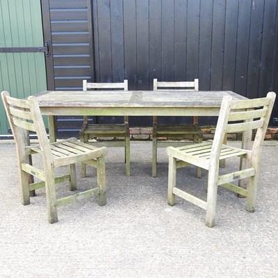 Lot 549 - A table and chairs