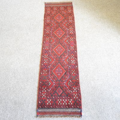 Lot 689 - A Persian runner