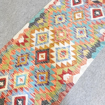 Lot 287 - A kilim runner