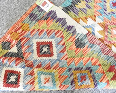 Lot 287 - A kilim runner