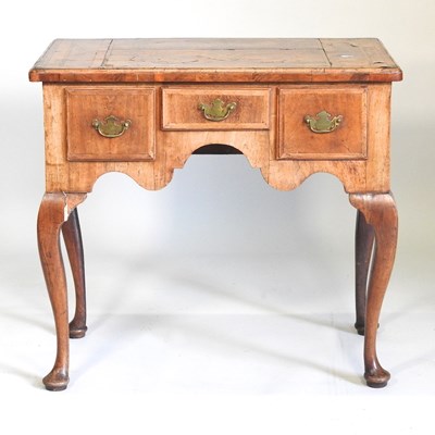 Lot 371 - An 18th century lowboy