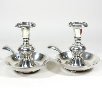 Lot 617 - A  pair of chambersticks