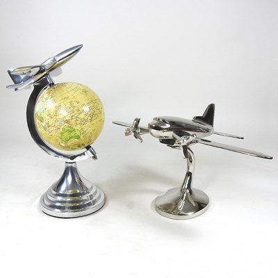 Lot 716 - A globe and a plane