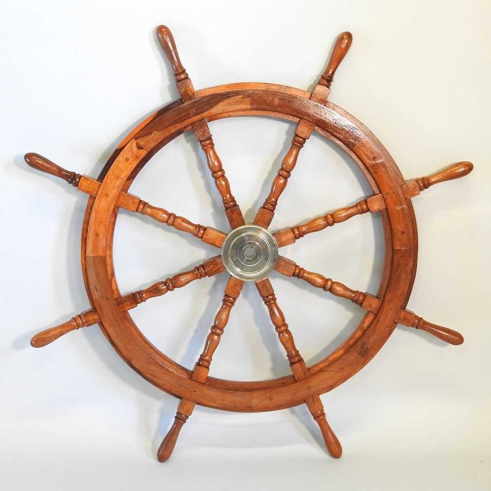 Lot 526 - A ship's wheel