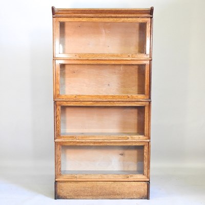 Lot 504 - A glazed bookcase