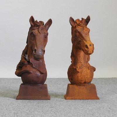 Lot 330 - A pair of rusted metal horse head gatepost finials
