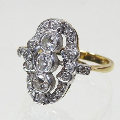 Lot 231 - An 18 carat gold diamond cluster ring