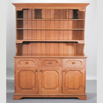 Lot 379 - A modern light oak dresser