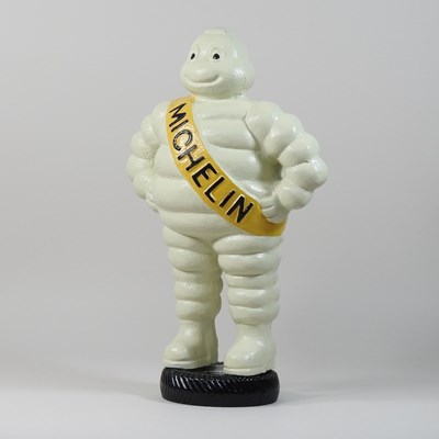 Lot 140 - A large painted metal model of the Michelin man