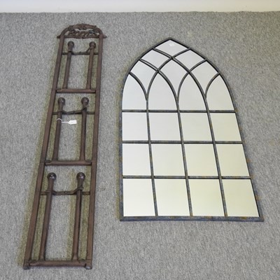 Lot 415 - A metal wall hanging boot rack