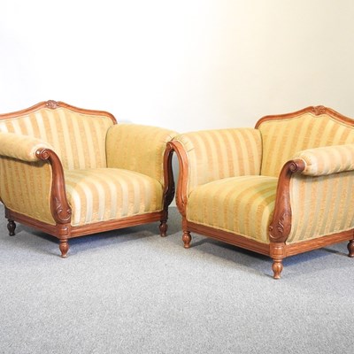 Lot 354 - A pair of gold striped upholstered armchairs