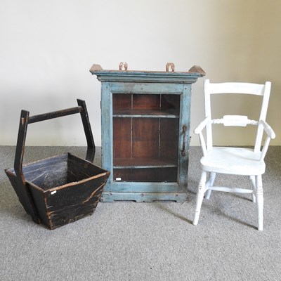 Lot 574 - A cabinet, chair and trug