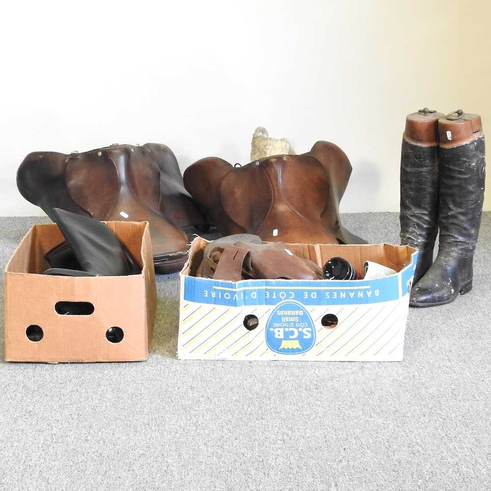 Lot 244 - A collection of boots and tack