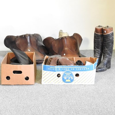 Lot 244 - A collection of boots and tack