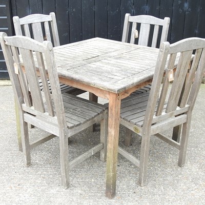 Lot 199 - A garden table and chairs