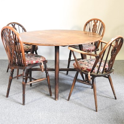 Lot 531 - An Ercol table and chairs