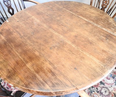 Lot 531 - An Ercol table and chairs